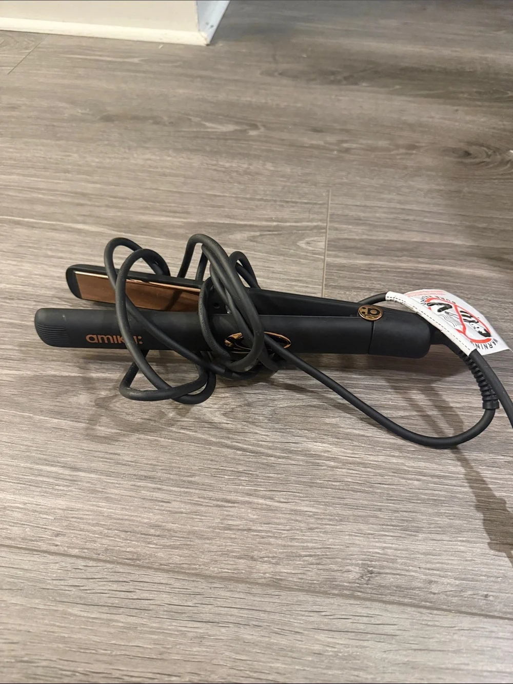 amika Black Flat Iron with Rose Gold Plates